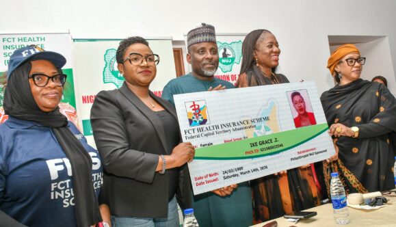 Dr. Adedolapo Fasawe, NUJ President Urges Philanthropists to Sponsor Health Insurance for Journalists as NUJ FCT Launches Scheme  By Raymond Enoch